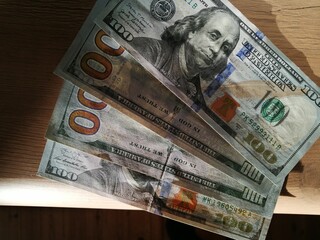 American hundred dollars on the table