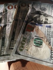 American hundred dollars on the table