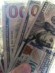 American hundred dollars on the table