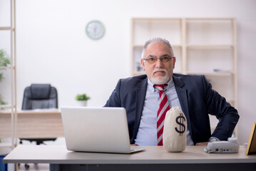 Old male employee in remuneration concept