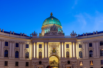 Hofburg palace on St. Michael square (Michaelerplatz) at night, Vienna, Austria