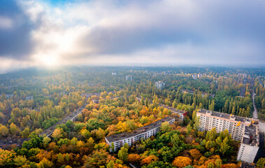 Ukraine,KyivOblast, Pripyat, Aerial view of abandoned city at autumn sunset