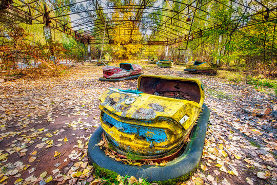 Ukraine, Kyiv Oblast, Pripyat, Abandoned bumper cars inPripyat Amusement Park
