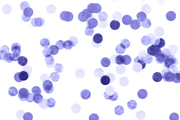 Festive purple confetti background. Flat lay style.