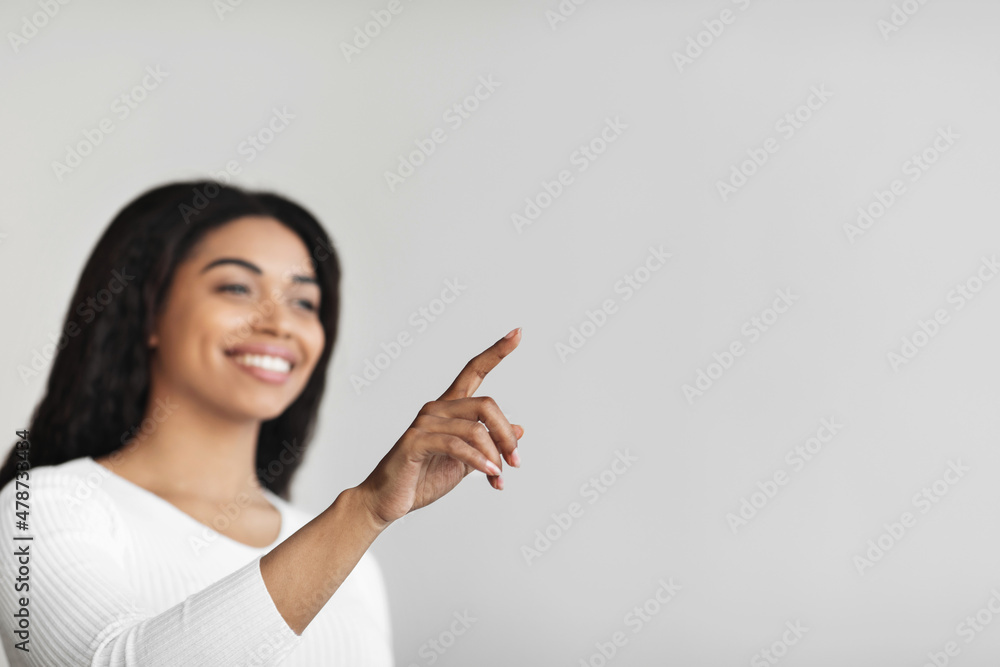 Poster modern futuristic house control system. black woman pointing finger in the air pushing button on inv