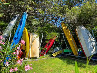 Boats parked on land next to sea in harbor marina at Hermitage Point in Sydney