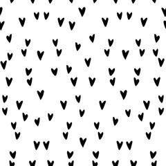 Vector Seamless abstract pattern of small black hearts. Hand drawn doodle background, texture for textile, wrapping paper, Valentines day.
