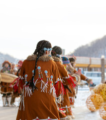 Folk ensemble performance in dress of indigenous people of Kamchatka. Selective focus