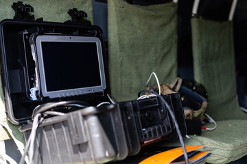 futuristic military suitcase with tablet, spy