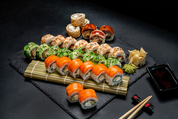 tasty sushi on the black background