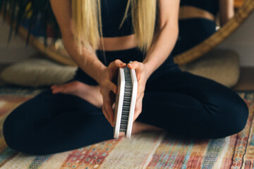 Person holding sadhu board for standing on nails practice