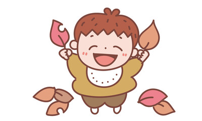 枯れ葉で遊ぶ赤ちゃん