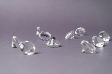 Diamonds out of Glas on a grey Background