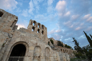 Evening sky with clouds against the background of the ruins of ancient greek architecture