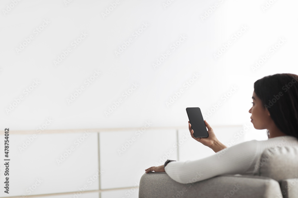 Poster concept of smart home and mobile application for managing smart devices at home. black woman control
