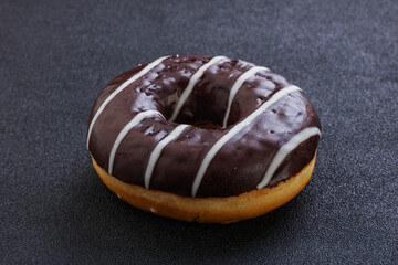Glazed sweet tasty chocolate donut