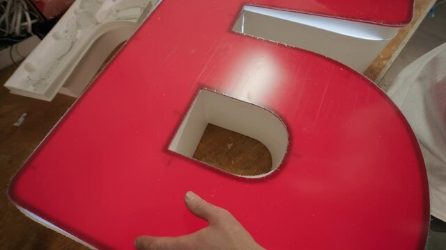 Production of advertising signs in the factory