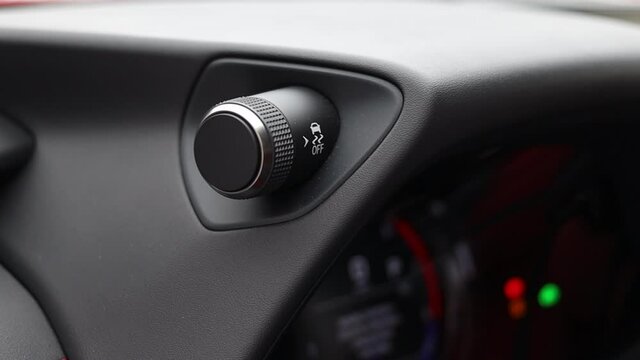 Lever for turning on and off the esp system in a modern car. car safety systems skid control