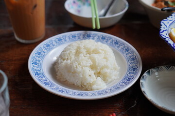 Steamed rice in a bowl served. Main food for Asians.