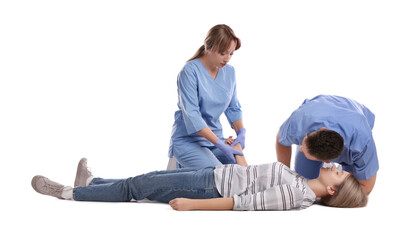 Medical workers in uniform performing first aid on unconscious woman against white background - obrazy, fototapety, plakaty