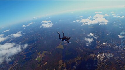 Sky diving in clouds