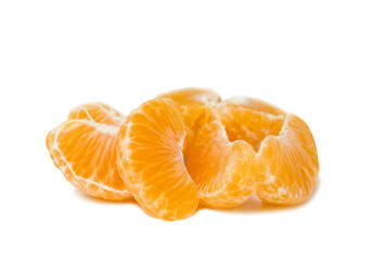 Tangerines slices isolated on white background. Peeled tangerine 