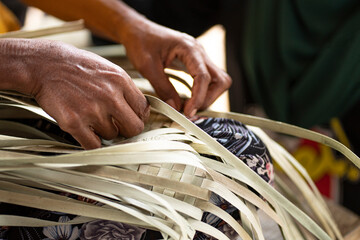 Close-up of the traditional weaving done by the indigenous  people using the bur rush plant leaves....