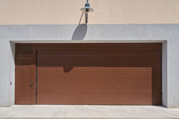 Wide rolling garage door with door
