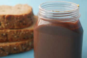 Chocolate Hazelnut cream in a container on table 