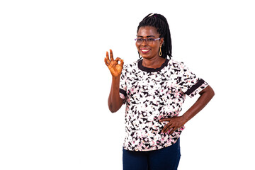 portrait of a beautiful smiling woman with okay gesture.