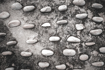 Abstract white stone texture dark black background