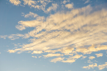 Naklejka na ściany i meble blue sky and clouds background during sunset time