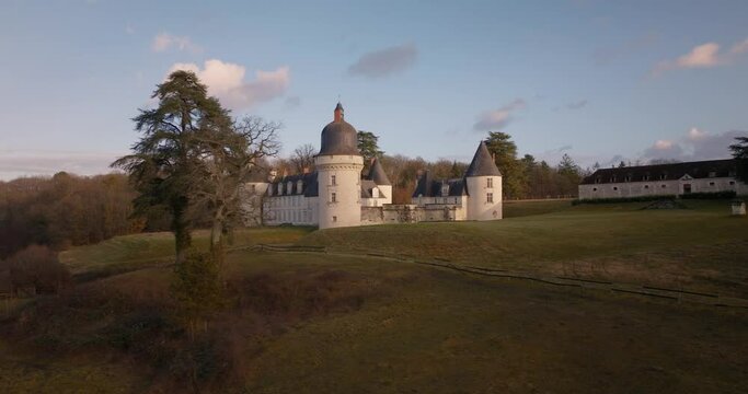 Aerial shot of the castle of the Gu&eacute; P&eacute;an by sunset in Monthou-sur-Cher, next to the Loire Valley, in France.