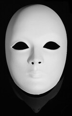 Plaster Venetian mask on black