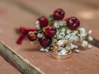 wedding rings and rose