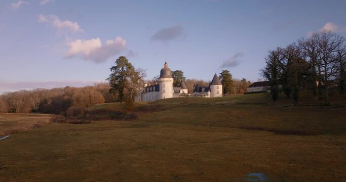 Aerial shot of the castle of the Gu&eacute; P&eacute;an by sunset in Monthou-sur-Cher, next to the Loire Valley, in France.