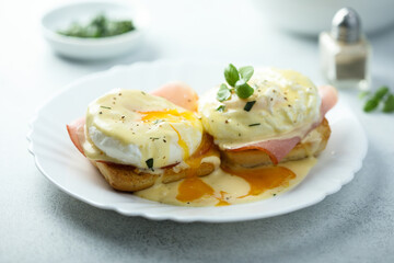 Traditional homemade Benedict eggs with ham