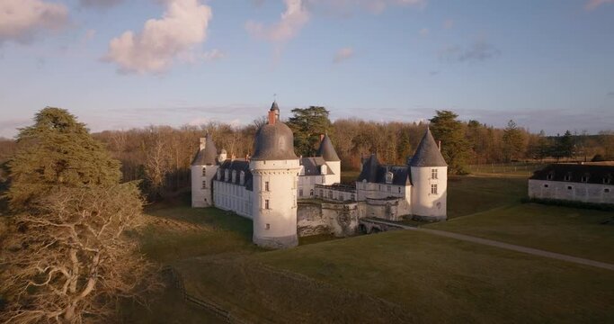 Aerial shot of the castle of the Gu&eacute; P&eacute;an by sunset in Monthou-sur-Cher, next to the Loire Valley, in France.