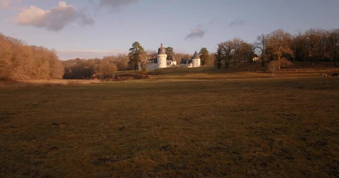 Aerial shot of the castle of the Gu&eacute; P&eacute;an by sunset in Monthou-sur-Cher, next to the Loire Valley, in France.