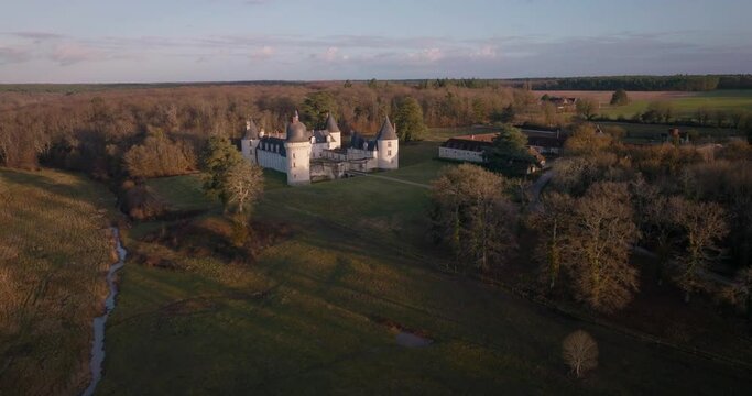 Aerial shot of the castle of the Gu&eacute; P&eacute;an by sunset in Monthou-sur-Cher, next to the Loire Valley, in France.