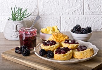 Fresh scones topped with Blackberry jam