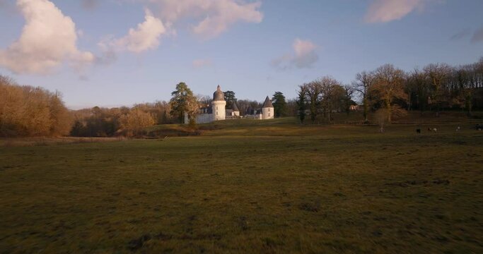 Aerial shot of the castle of the Gu&eacute; P&eacute;an by sunset in Monthou-sur-Cher, next to the Loire Valley, in France.