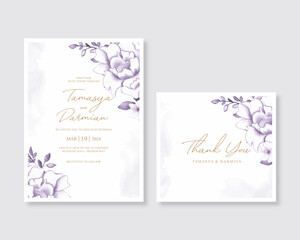 Elegant wedding invitation card with purple watercolor floral