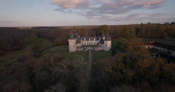 Aerial shot of the castle of the Gu&eacute; P&eacute;an by sunset in Monthou-sur-Cher, next to the Loire Valley, in France.