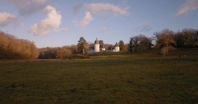 Aerial shot of the castle of the Gu&eacute; P&eacute;an by sunset in Monthou-sur-Cher, next to the Loire Valley, in France.