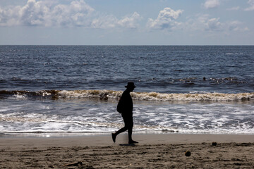 People Silhouettes at the Beach in Costa Rica