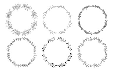 Obraz premium Set of hand drawn doodle round floral wreaths frames. Flower line and leaf circle frames design elements for wedding, mothers day, birthday, invitations.