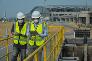 workers at work. Wastewater treatment concept. Service engineer on  waste water Treatment plant