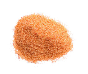 Heap of orange salt on white background, top view