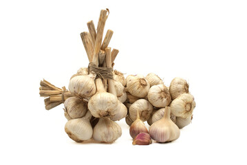 Braided garlic bulbs isolated on white background